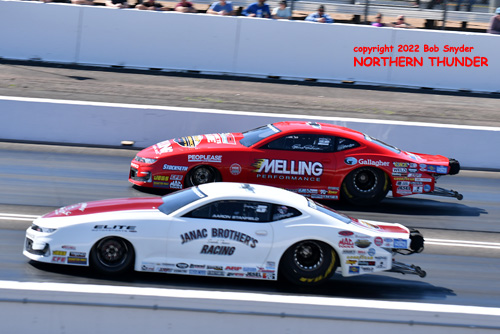 Aaron Stanfield (near lane) vs Erica Enders 
(far lane) - PS